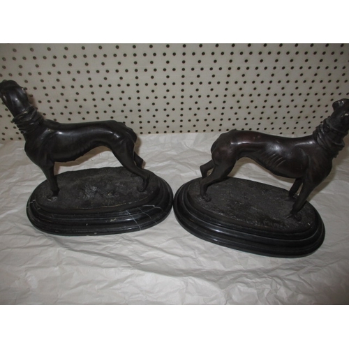 293 - Two cast bronze greyhounds on marble bases, after Mene, approx. height 22cm in good pre-owned condit... 