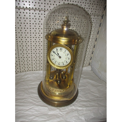 234 - A large anniversary clock under glass dome, in used condition, no key so not tested as to function, ... 