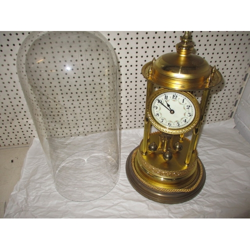 234 - A large anniversary clock under glass dome, in used condition, no key so not tested as to function, ... 