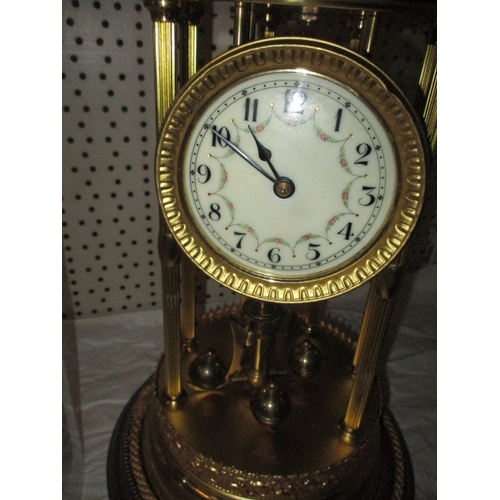 234 - A large anniversary clock under glass dome, in used condition, no key so not tested as to function, ... 