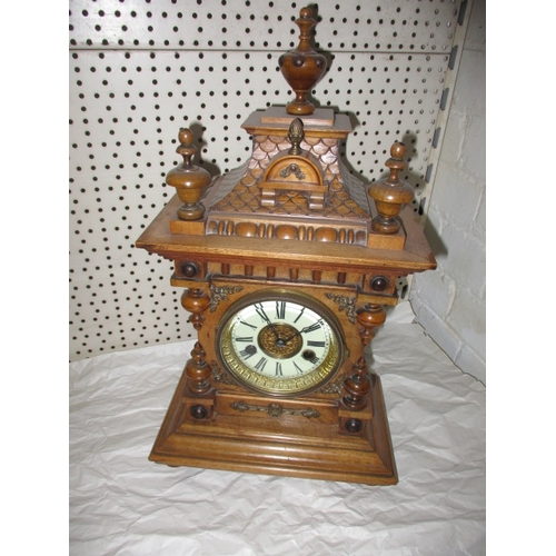 236 - A vintage German 2 train mantle clock in wood case, approx. height 44cm, no key so not tested as to ... 