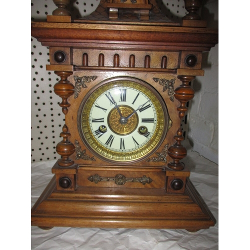 236 - A vintage German 2 train mantle clock in wood case, approx. height 44cm, no key so not tested as to ... 