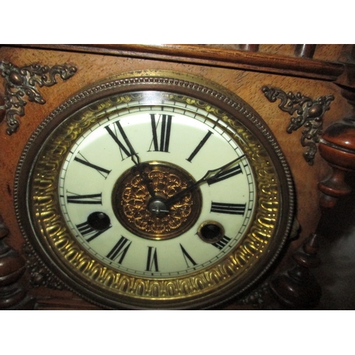 236 - A vintage German 2 train mantle clock in wood case, approx. height 44cm, no key so not tested as to ... 