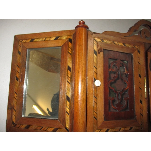 239 - An antique style wall clock, the dial marked Cornwell Braintree, having an inlaid wood case, no key ... 