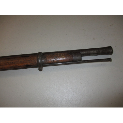 225 - A 19th century percussion musket, with working lock, approx. length 146cm in well used condition