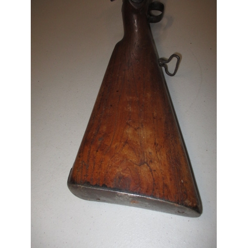 225 - A 19th century percussion musket, with working lock, approx. length 146cm in well used condition