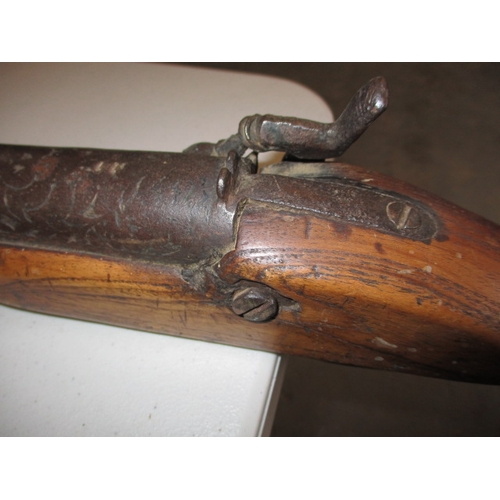 225 - A 19th century percussion musket, with working lock, approx. length 146cm in well used condition