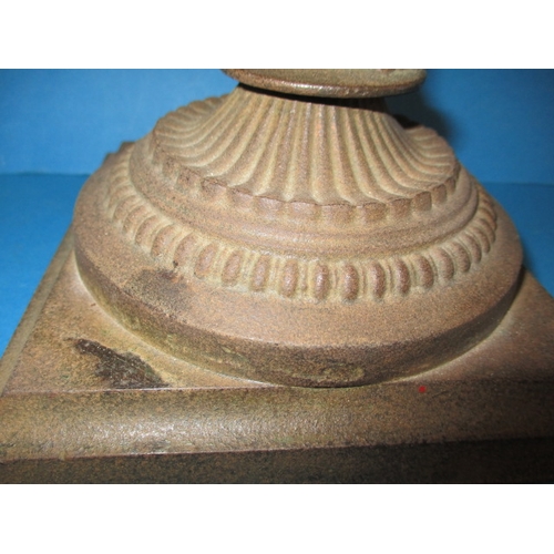 306 - An antique cast iron figural oil lamp, having copper reservoir, use and age related marks, no shade