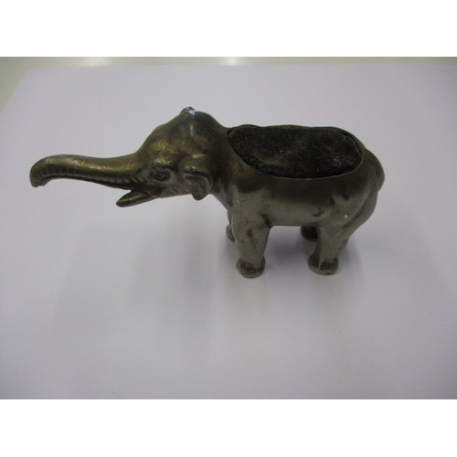 180 - A vintage elephant pin cushion, approx. length 10cm, in used condition with ware to plating