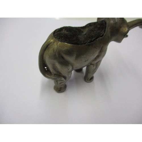 180 - A vintage elephant pin cushion, approx. length 10cm, in used condition with ware to plating