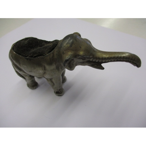 180 - A vintage elephant pin cushion, approx. length 10cm, in used condition with ware to plating