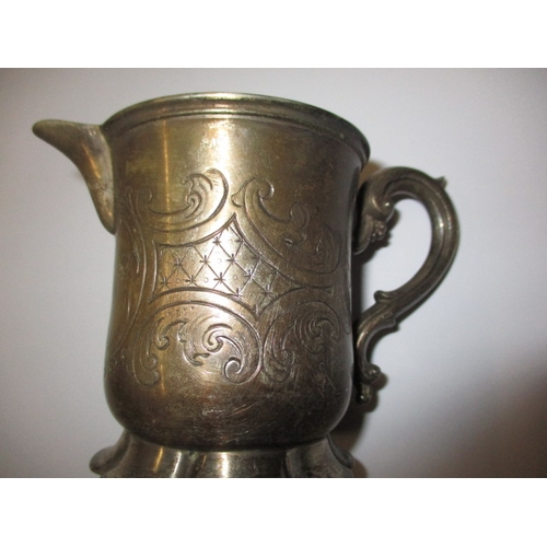 168 - A Victorian sterling silver cream jug, approx. weight 103.1g in good pre-owned condition with surfac... 