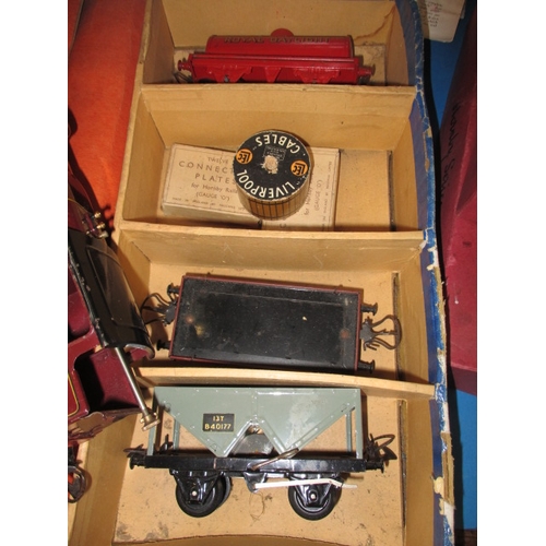 213 - A parcel of Hornby ‘0’ gauge model railway tinplate, most in original boxes, all in used condition