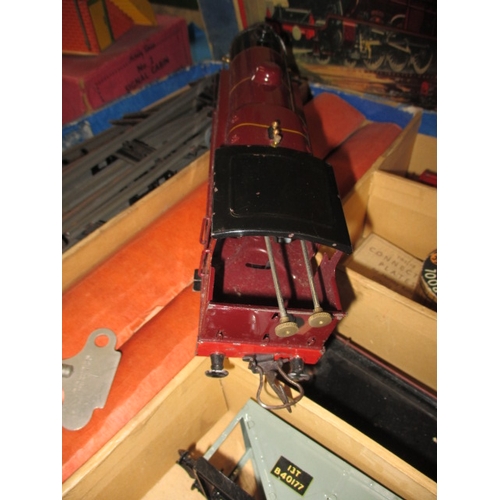 213 - A parcel of Hornby ‘0’ gauge model railway tinplate, most in original boxes, all in used condition