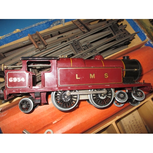 213 - A parcel of Hornby ‘0’ gauge model railway tinplate, most in original boxes, all in used condition