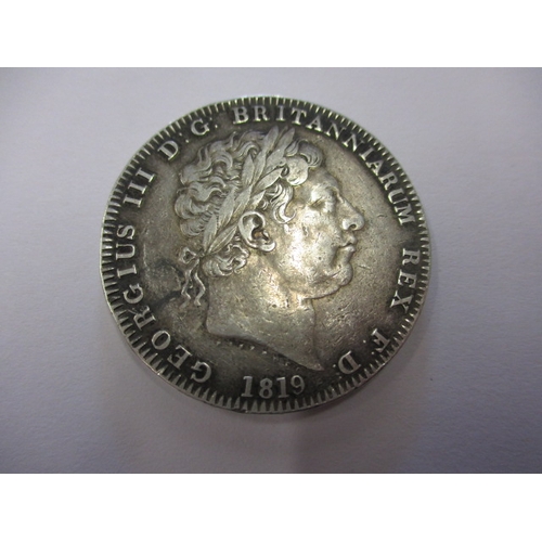 138 - A parcel of silver coins and a medal, to include a George III crown1819, a Victorian crown 1890, a d... 