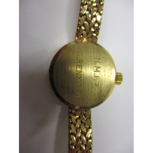 84 - A 9ct yellow gold ladies wrist watch with integral gold strap, marked Garrard, in original box, requ... 