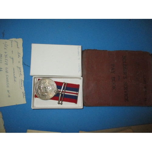 225 - A parcel of mainly military related ephemera and a WWII medal, all in used condition