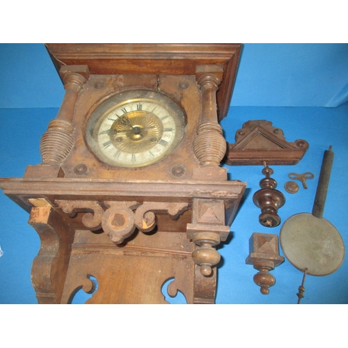 308 - A vintage mahogany cased wall clock, in need of restoration