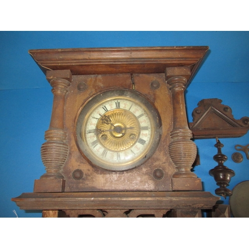 308 - A vintage mahogany cased wall clock, in need of restoration