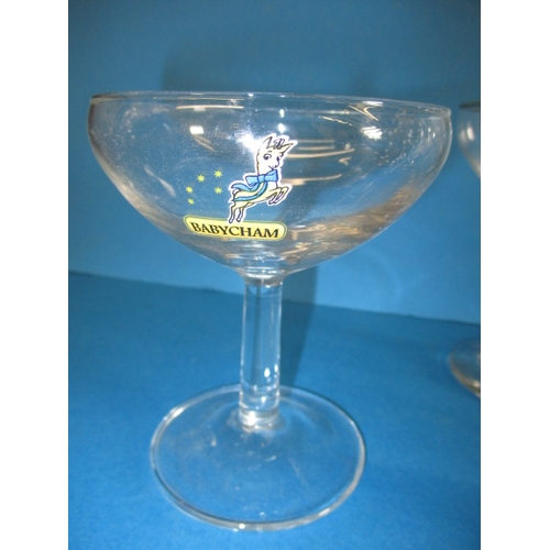 312 - 8 Vintage Babycham glasses, one odd one, all in used condition with no observed damage