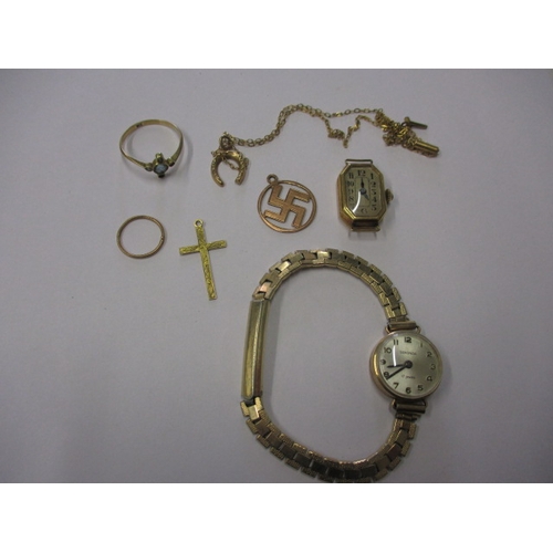 80 - A parcel of gold and yellow metal items, to include 2 gold cased watches, all in used condition with... 