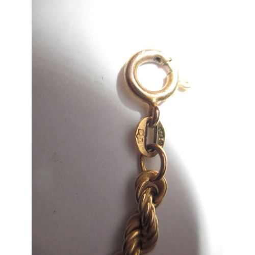 61 - A 9ct gold rope necklace, a gold cased watch and a ring, approx. chain length 40cm, all in used cond... 