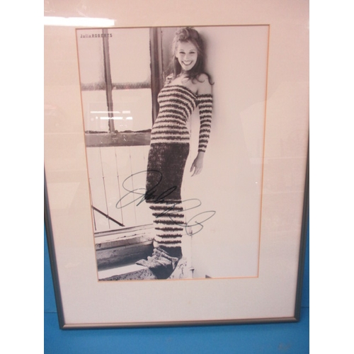 311 - A hand signed autograph photograph of Julia Roberts, with certificate of authenticity on back, appro... 