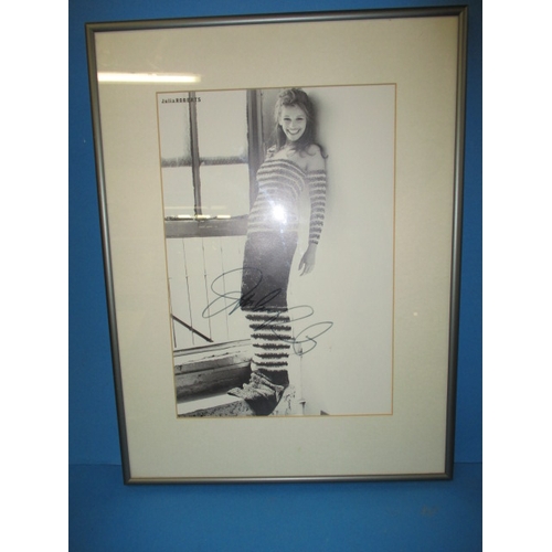 311 - A hand signed autograph photograph of Julia Roberts, with certificate of authenticity on back, appro... 