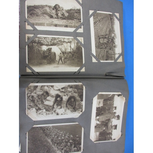 310 - An album of vintage postcards, over 200 in total, to include WWI and topographical examples, all in ... 