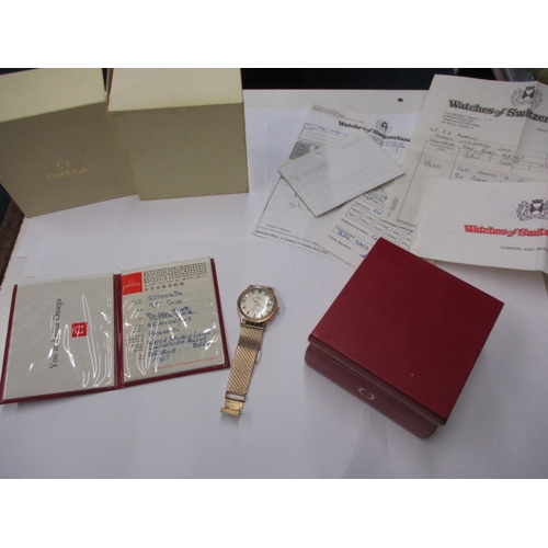 88 - A late 1960’s gold cased Omega automatic Seamaster watch, with 9ct gold mesh strap and date window, ... 