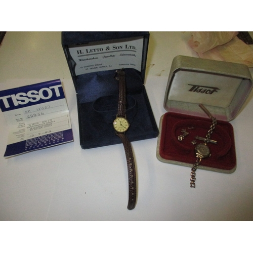 89 - A vintage 9ct gold Tissot ladies wrist watch and a later gold cased example, both with original boxe... 