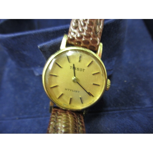 89 - A vintage 9ct gold Tissot ladies wrist watch and a later gold cased example, both with original boxe... 