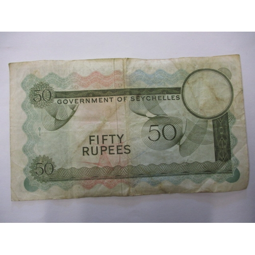 137 - A 1970 Seychelles “SEX” 50 Rupees bank note, an engraver at Bradbury & Wilkinson hid the message in ... 