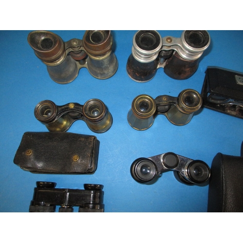 253 - A parcel of vintage binoculars and opera glasses, all in used condition