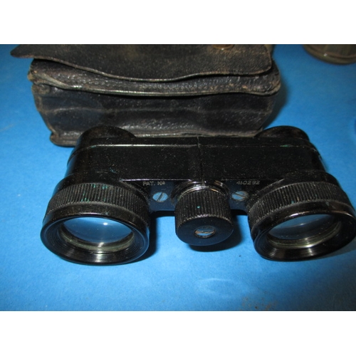 253 - A parcel of vintage binoculars and opera glasses, all in used condition