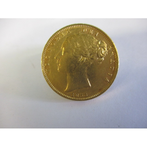 120 - A Victorian gold shield back sovereign dated 1853, a circulated coin with good definition of feature... 