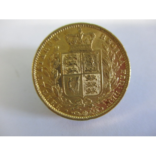 120 - A Victorian gold shield back sovereign dated 1853, a circulated coin with good definition of feature... 