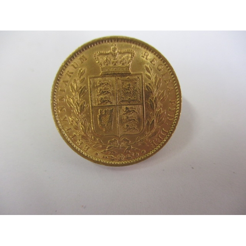 121 - A Victorian gold shield back sovereign dated 1862, a circulated coin with good definition of feature... 