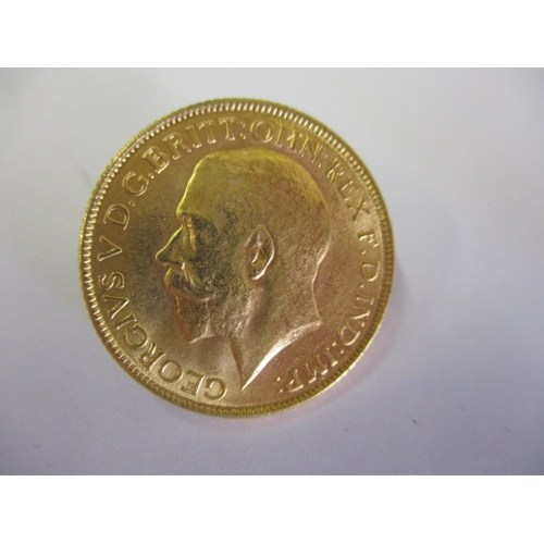 122 - A George V full gold sovereign with Indian mint mark dated 1918, a circulated coin with good definit... 