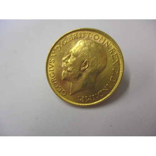 122 - A George V full gold sovereign with Indian mint mark dated 1918, a circulated coin with good definit... 