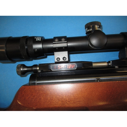 243 - An Air-Arms SM100 .177 air rifle, with telescopic sight, gun slip and user handbook, in very good us... 