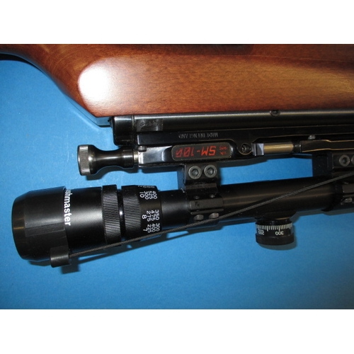 243 - An Air-Arms SM100 .177 air rifle, with telescopic sight, gun slip and user handbook, in very good us... 