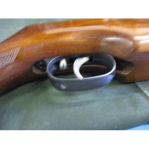 244 - A Weihrauch HW80, 5.5mm break barrel air rifle, open sights and gun slip, in good working order