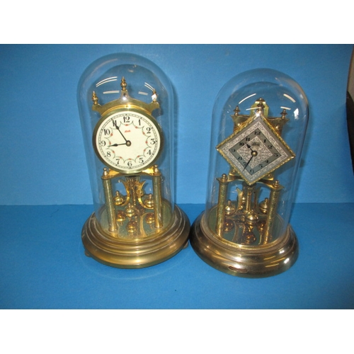 256 - Two vintage anniversary clocks under glass domes, no keys so not tested as to function, approx. heig... 