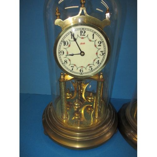 256 - Two vintage anniversary clocks under glass domes, no keys so not tested as to function, approx. heig... 