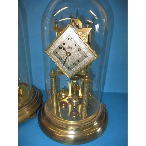 256 - Two vintage anniversary clocks under glass domes, no keys so not tested as to function, approx. heig... 