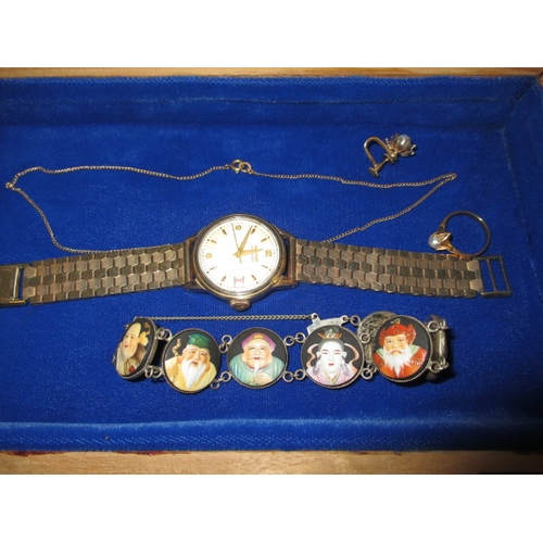 173 - A vintage jewellery box with contents, to include 22ct and 9ct gold items and various silver items, ... 