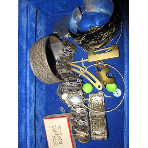 173 - A vintage jewellery box with contents, to include 22ct and 9ct gold items and various silver items, ... 