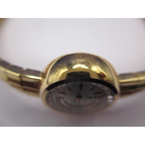 93 - A vintage gold ladies omega wrist watch, with integral strap marked 750, approx. gross weight 34.8g ... 